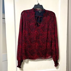 Red and black long sleeve blouse